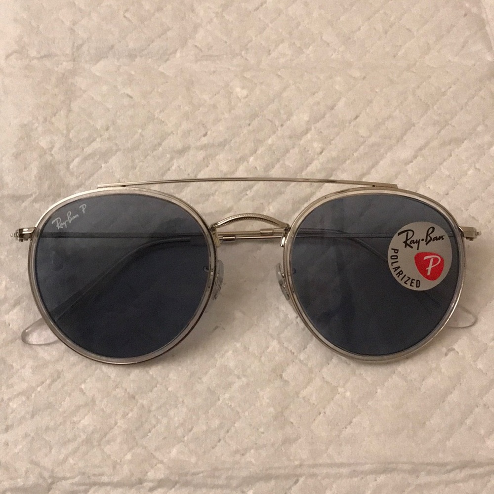 Ray Ban sunglasses.